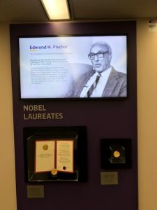 Photo of Nobel Laureates display with medals.