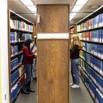 Students in the HSL stacks