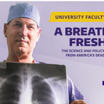 Dr. Douglas Wood holding lung X-ray.